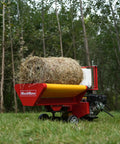 Hay Baler And Wrapper Combo HB3120 HW20 for farms, compact red baler with hay bale in wooded area, featured in field.