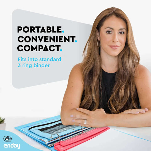 Woman sitting beside portable 3 hole punch for papers and binders with built in 10 inch ruler, removable chip tray, in various colors.