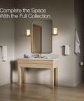 Elate 12-Inch Towel Bar in Vibrant Brushed Moderne Brass next to modern bathroom vanity and mirror