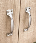 Stainless Steel Furniture Handles Set for Cabinets and Drawers, 4.9 Inch Length, mounted on wooden cabinet doors