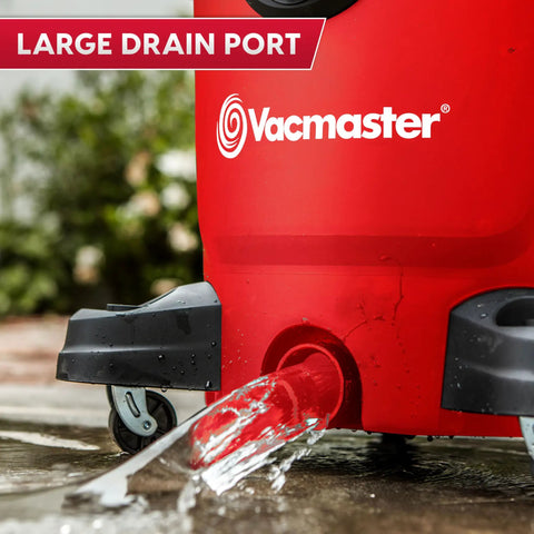 Heavy Duty 12 Gal Wet Dry Shop Vac With Beastly 5.5 Peak HP Motor And Nine Must Have Cleaning Attachments For Cranking Nasty Garage Jobs And Spills Features Classic Red Plastic Design showing large drain port with water flowing.
