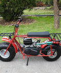 Side view of a mini bike with Beefed Up Colorful Exhaust Header Pipe Muffler With Heat Shield Tape Kit installed