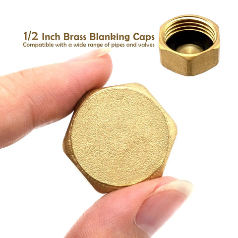 Two Pack Half Inch Brass Blanking Caps With Gasket, female thread nut caps for plumbing fittings and valves, shown in hand