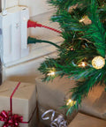 Six Outlet Swivel Power Strip With Two USB Ports, Space Saving Wall Tap Surge Protector Up To 2100 Joules in use by a decorated Christmas tree