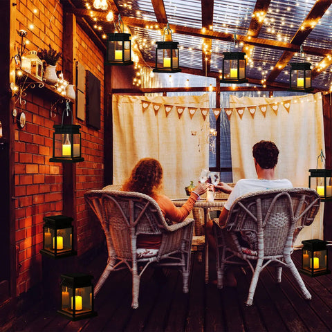 18 Pack Hanging Solar Lanterns For Outdoor Garden And Yard, Waterproof LED Lantern Lights on deck with couple