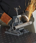 Cradle Angle Drill Press Vise With 3.5 Inch Jaw Opening gripping a metal pipe