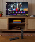 Universal Smart TV Remote Control For All LED LCD QLED UHD SUHD HDR Frame Curved 4K 8K 3D Replacement on a table
