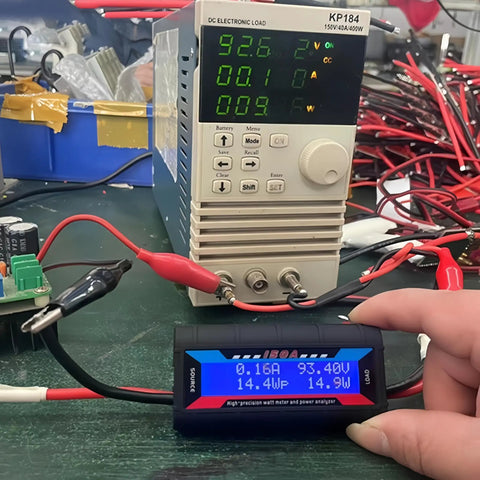Badass No Sweat Plug And Play 200A Digital Wattmeter measuring volts and amps in a workshop with electronic load.