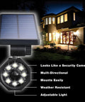 Bionic Spotlight Solar Motion Light for Outdoors 25 Feet Coverage, mounted, illuminating house exterior at night.