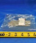 Ten Pack Of Shop Spec Taper Alignment Dowel Pins Four Inches Long Standard Size Solid Steel in packaging with ruler for size reference.
