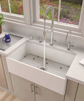 Protective Sink Grid For GR533 And AB532 AB533 Stainless Steel in farmhouse sink, ensuring surface protection and ease of cleaning.
