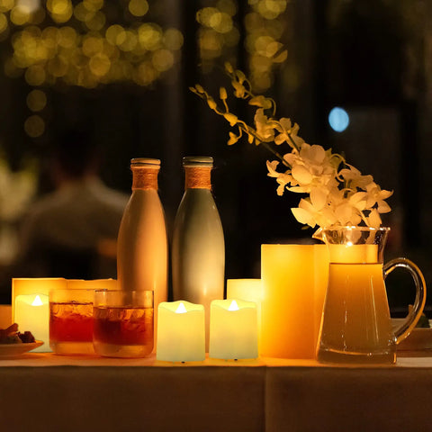Rechargeable Flameless Tea Lights With Timer And Remote 12 Pack Flickering LED Votive Candles on decorated table