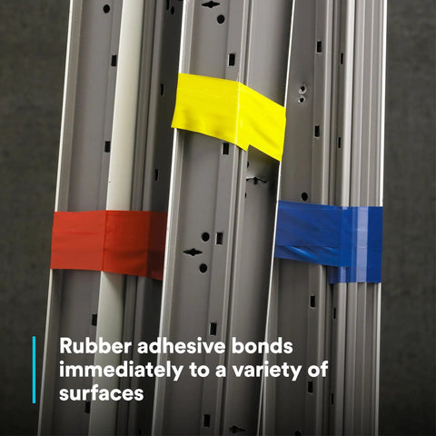 Colored vinyl tape securing metal frames, showcasing rubber adhesive strength, similar to Vinyl Tape 764 General Purpose White 3 Inch By 36 Yard Roll.