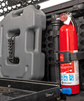 Weather Resistant Rubber Molle Panel Adjustable Clamp Kit holding fire extinguisher and gear in off-road vehicle