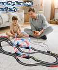 Child and adult playing with Dual Lane Slot Car Race Track Set With Four High-Speed Cars, Electric Track, Dual Controllers in living room.