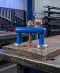 Heavy Duty Super Magnetic Welding Support Clip With Strong Suction adjustable magnet clamp on a metal work table for pro welders.