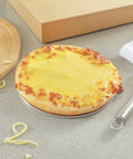 Cheese pizza on an aluminum 6 inch pizza screen designed for crispy crust and fast even baking, seamless rim visible