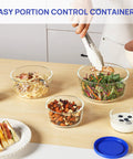 Glass Bowls Set Of Four With Lids, 1, 2, 4 And 7 Cup Sizes, Food Storage And Meal Prep Containers on table with assorted food