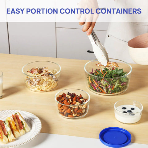 Glass Bowls Set Of Four With Lids, 1, 2, 4 And 7 Cup Sizes, Food Storage And Meal Prep Containers on table with assorted food
