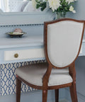 Elegant vanity setup with a wooden chair and blue desk, showcasing 1152 Pcs Self Adhesive Screw Hole Stickers And 120 Pcs Screw Cap Covers Set.