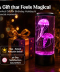Lifelike Jellyfish Lamp With Sixteen Color Options And Four Modes Auto Shutoff Remote Controlled LED Night Light glowing pink beside gift.