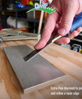 Hand sharpening chisel on Dia Sharp Bench Stone Diamond Knife Sharpener For Workshop Jobsite And Kitchen Extra Fine Flat Surface.