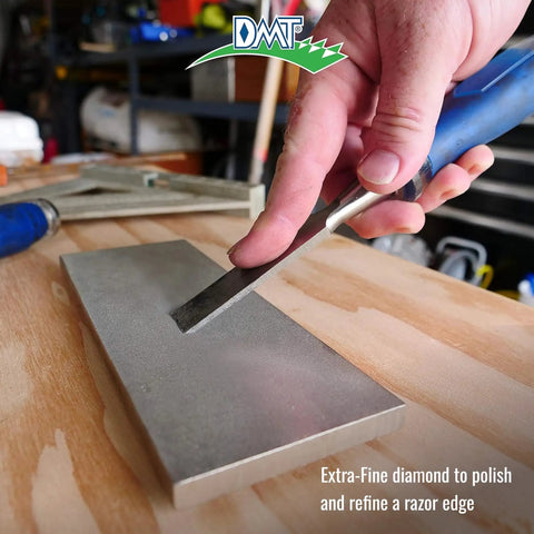Hand sharpening chisel on Dia Sharp Bench Stone Diamond Knife Sharpener For Workshop Jobsite And Kitchen Extra Fine Flat Surface.
