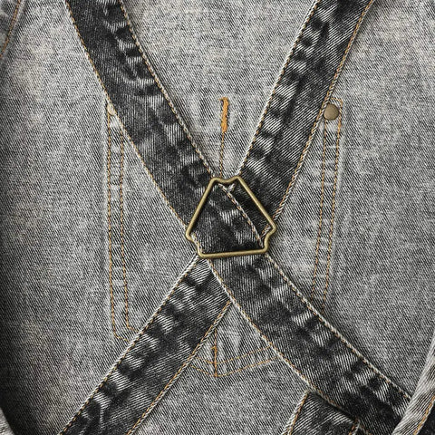Back view of black durable denim work apron with cross back straps detail for Denim Hair Stylist Tool Apron With Pockets For Women.
