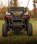 Arched Boxed Radius Rods for Polaris RZR Pro XP and Pro XP 4 Off Road Upgrade With High Ground Clearance Beefy Rugged Steel Build Powder Coated Black Finish Easy Install And Durable Performance, rear view on RZR Pro XP