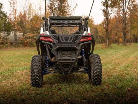 Arched Boxed Radius Rods for Polaris RZR Pro XP and Pro XP 4 Off Road Upgrade With High Ground Clearance Beefy Rugged Steel Build Powder Coated Black Finish Easy Install And Durable Performance, rear view on RZR Pro XP