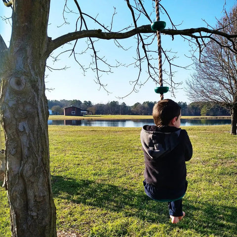 Child on Heavy Duty Kid Friendly Climbing Rope Swing Kit With Platforms And Disc Seat For Tree Or Swing Set Fun Outdoor Gear