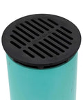 Grate Cover for Round 6 Inch Speed-D Catch Basin on green pipe, blocks debris, black plastic, ideal for small lawns and patios