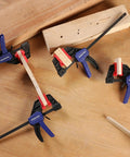 6 Inch Mini Bar Clamps For Woodworking, One Handed F Clamps And Spreaders, 4 Pack With 50 Lb Load, Throat One And A Half Inches, Screw Reverses To Convert To Spreader For Tight Glue Ups For Diyers on wood pieces