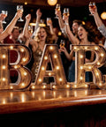 Light Up BAR Sign LED Marquee Letter For Home Bar And Party Decor, Vintage Style with illuminated letters at a lively party.