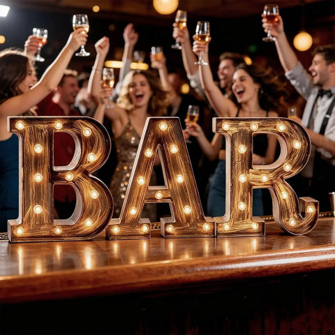 Light Up BAR Sign LED Marquee Letter For Home Bar And Party Decor, Vintage Style with illuminated letters at a lively party.