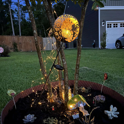 Solar Fairy Garden Lights Moon Star Glass Globe Pathway Stakes Waterproof Outdoor Decor for Patio Yard and Lawn Solar Powered Night Lighting Chill Vibes Ambient Glow for Backyard Ambiance with fairy silhouette.