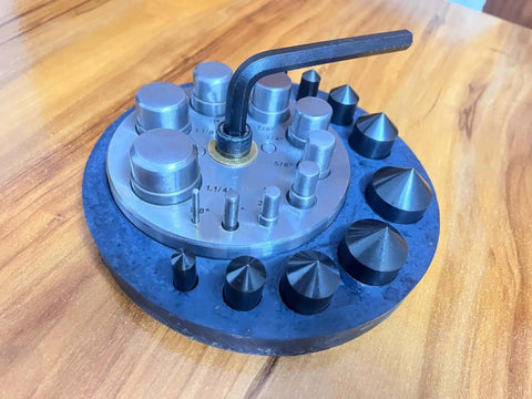 Round Disc Cutter Set With Ten Hardened Steel Punches And Dies Rubber Base Circle Cutter For Jewelry Making on wooden surface