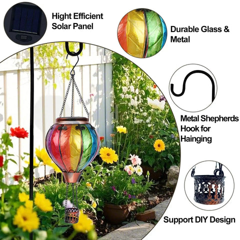 Two Pack Hot Air Balloon Solar Lanterns With Metal Shepherds Hook For Outdoor Pathway Lighting Garden Decor And Cozy Flickering Flame Glow That Charges By Day And Shines At Night, showing colorful balloon and flowers