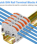 50 Pack Compact Din Rail Terminal Blocks Featuring Quick Snap Lever Wire Connectors For 28 To 12 Awg Electrical Wiring on a metal rail.
