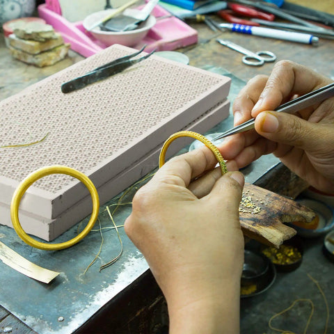 Hand working with Two Piece Honeycomb Ceramic Soldering Board Set For Jewelry Making, heat resistant up to 2000 degrees.