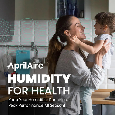 Mother holding child in kitchen highlighting Humidifier Maintenance Kit With Water Panel For Whole-House Humidifiers Models 350 And 360.
