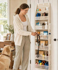 Real Deal Heavy Duty Over The Door Storage Rack With Six Tier Hanging Mesh Pockets, holding dog toys and treats.