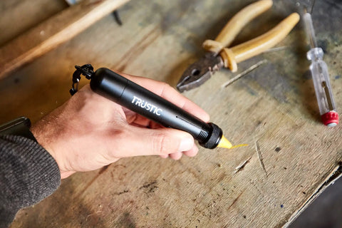 Heavy Duty Lumber Keel Crayon Holder For 1/2 Inch Round Or Hex Crayons, Industrial Carpenter Metal Grip in use on workbench