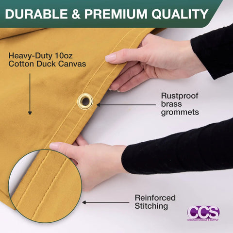 Hands holding Waterproof Waxed Canvas Tarp Cover 8x10 Ft Heavy Duty Duck Cloth With Rustproof Brass Grommets, close-up on grommet.