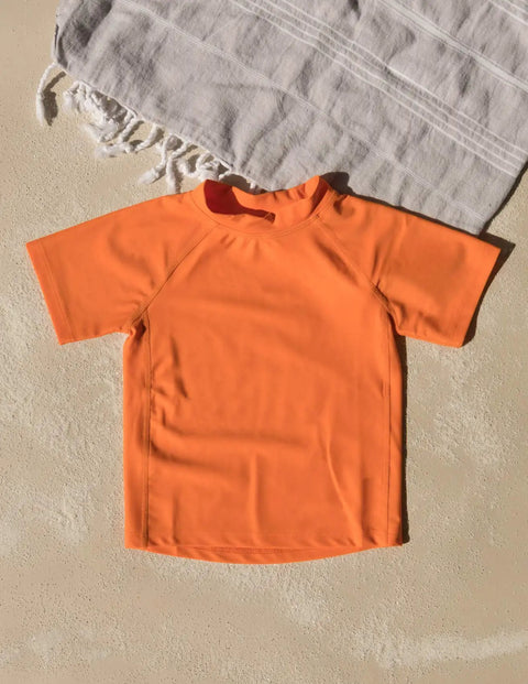 Toddler Orange Short Sleeve Rash Guard For Water Play With Tagless Comfort 82 Nylon 18 Elastane Sun Safe Swim Shirt That Keeps Sand And Sun At Bay Machine Wash Cold Inside Out Kid Friendly Fit.