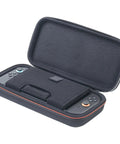 Game Traveler Deluxe Licensed Travel Case For Nintendo Switch Family, Black Small, open with Switch inside and carry handle visible