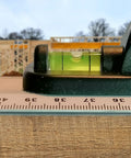 Aluminum Handle Ruler For Precise Cuts, 55cm Centimeter Ruler With Dual-Sided CM Markings on wooden surface
