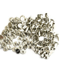 Sixty Pack Silver Chicago Screws Hella Tough Three Eighths Inch Flat Head Screw Posts Nickel Plated Metal Rivets scattered on white background.