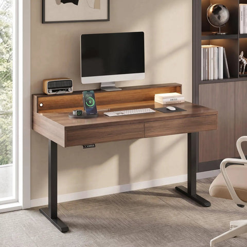 Height Adjustable Electric Standing Desk With Flip Top Hidden Storage And Handleless Drawers Featuring Motion Sensor LED Light For A Clean Workspace That Keeps Your Hustle Tight And Organized, showcasing wood finish, dual drawers, and monitor setup.