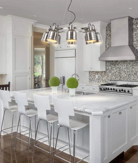 Nickel Modern Eight Light Industrial Wagon Wheel LED Chandelier For Your Kitchen Island Loft Dining Room With Metal Shades And Killer Energy Saving Bulbs Included in a kitchen setting over a marble island.